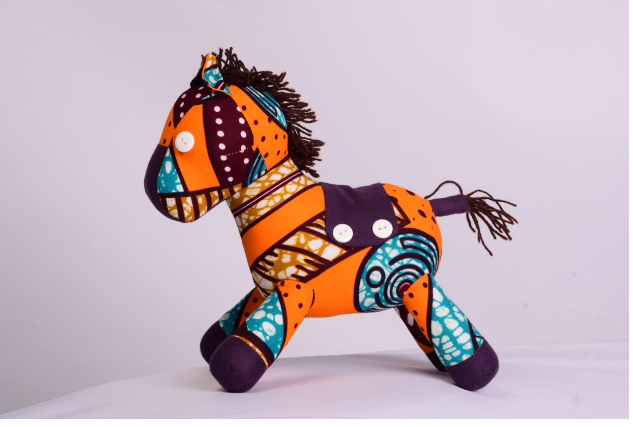 Handmade wooden toys with fabric details