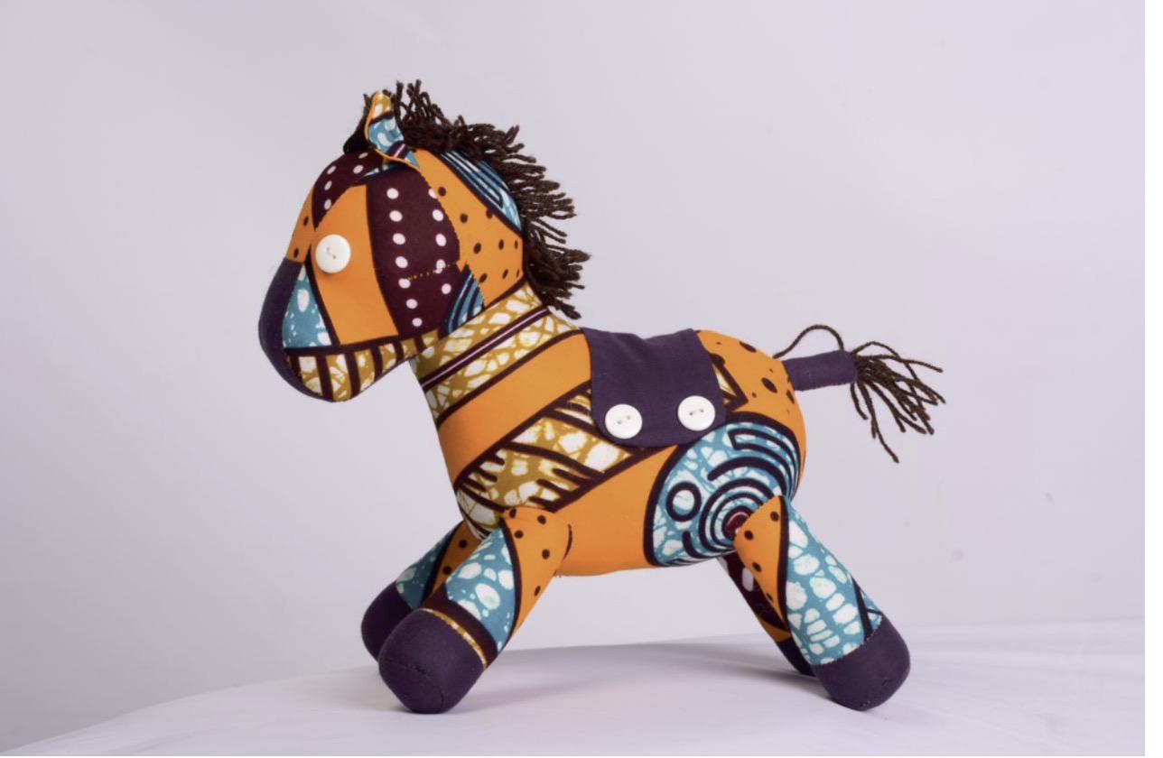 Handmade doll with colourful outfit